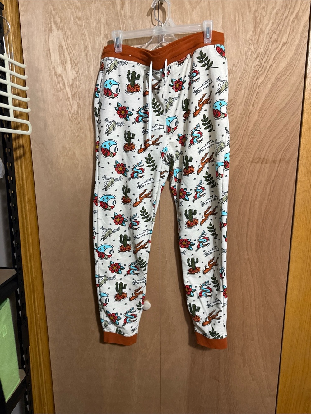 No Boundaries Orange Waistband Graphic Joggers